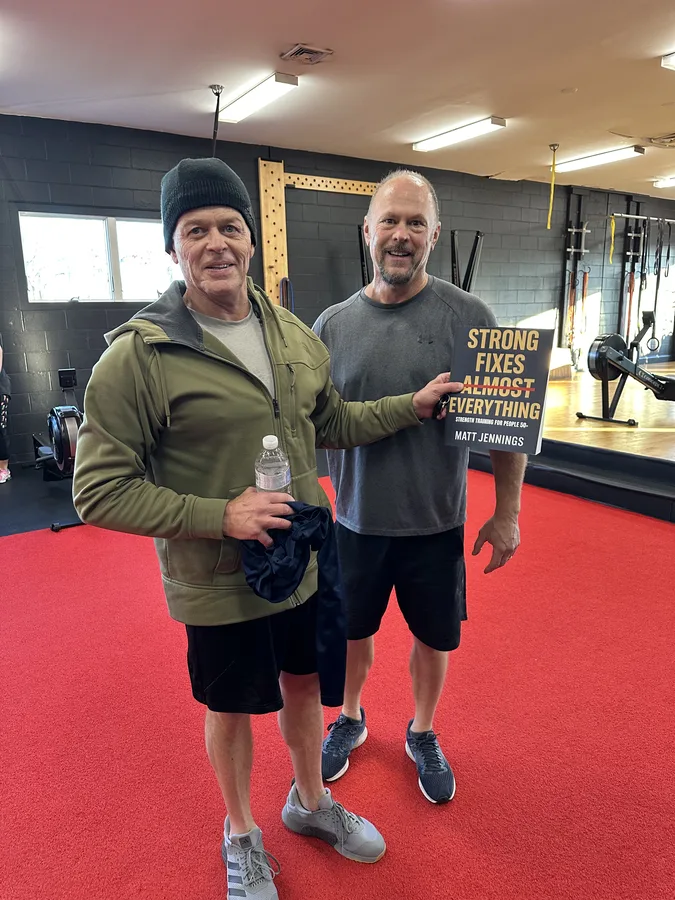 Members of The Lift Gym holding Strong Fixes Almost Everything